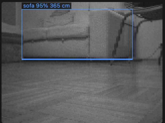 Camera picture with a box around a sofa, labelled sofa 95% 365 cm